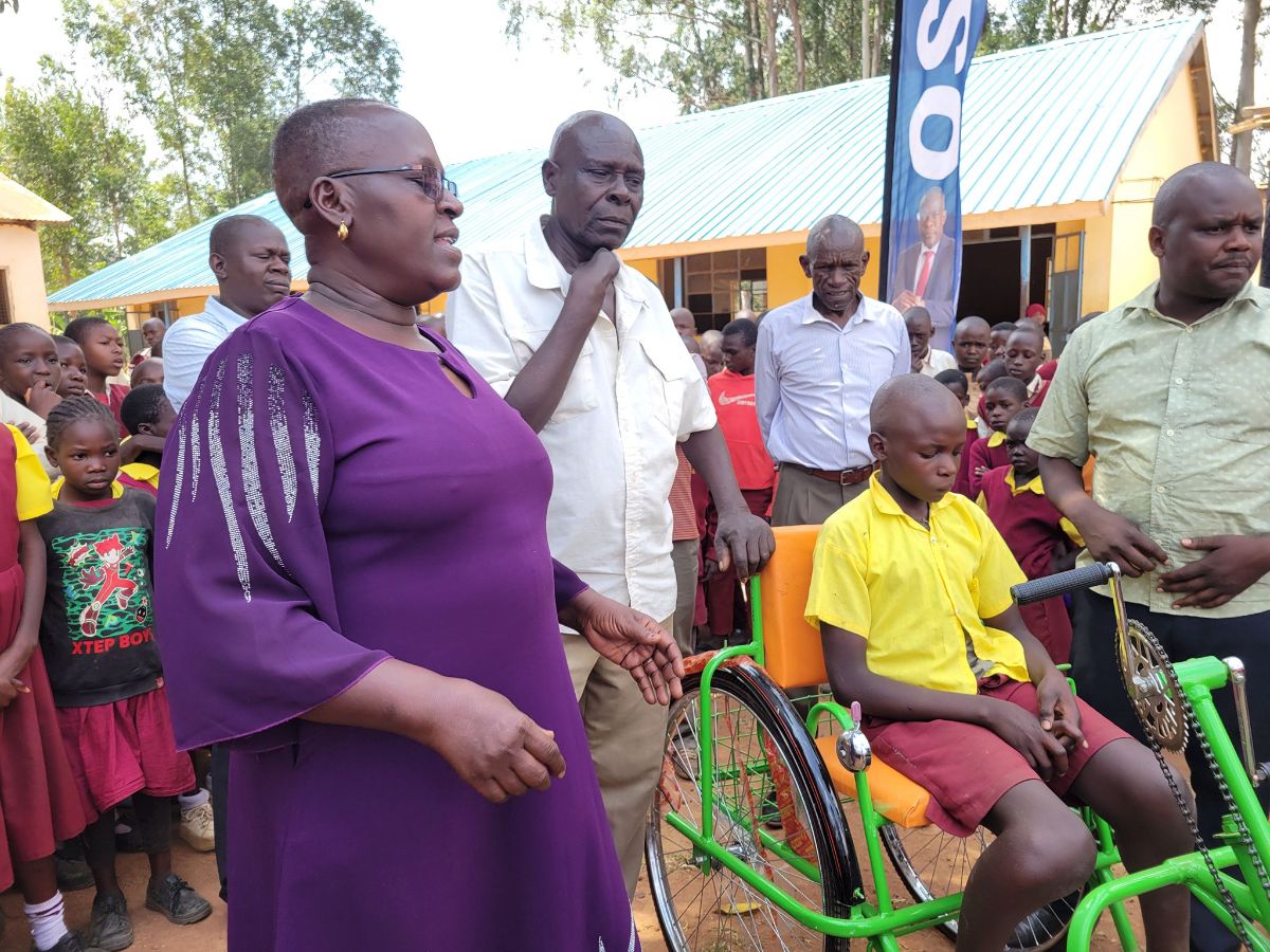 Delivering whelchair to s disabled pupil